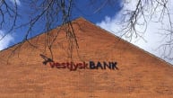 Vestjysk Bank opjusterer efter fortsat høj aktivitet