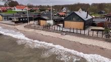 Voldsommere vejr får regeringen til at bremse byggeri med 'hundedyr og møgbesværlig' klimasikring